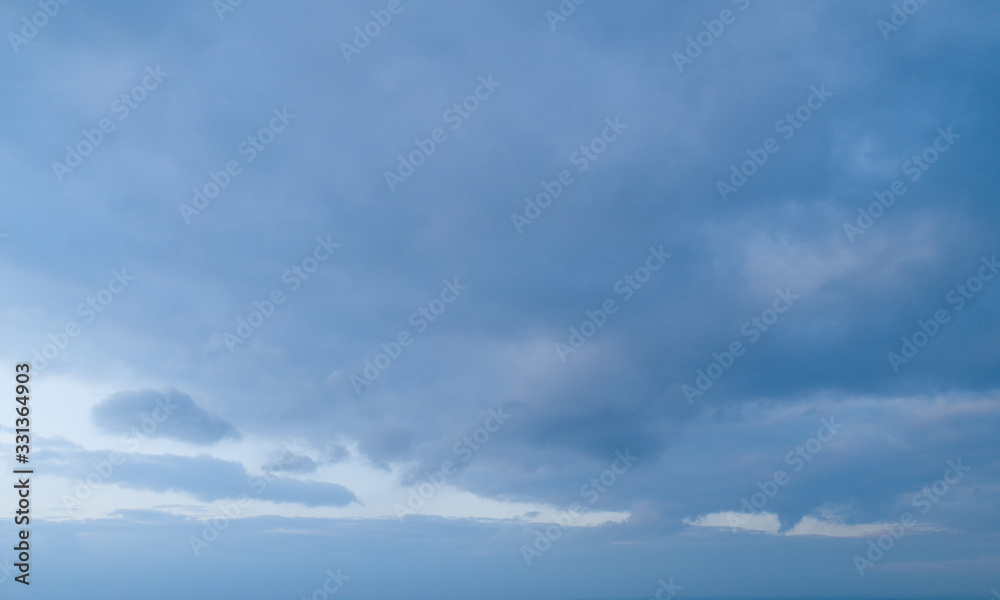 Canvas Prints Beautiful sky with stretched clouds during twilight.