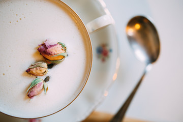 Hot chocolate served with flower decoration. New barista style. 