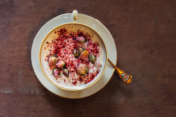 Hot chocolate served with flower decoration. New barista style. 