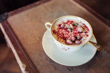 Hot chocolate served with flower decoration. New barista style. 