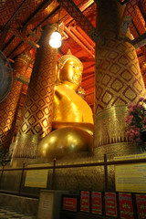 Big gold buddha in public temple of Ayutthaya province
