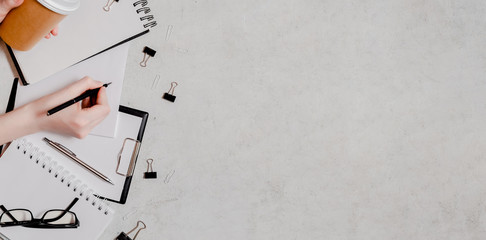 Isolation and work from home concept  flatlay. Pencils,notepad, ruler scissors and paper clips. Top...