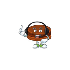 An attractive chocolate alfajor mascot character concept wearing headphone