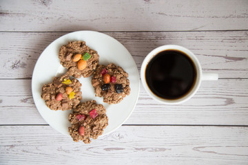 Cup coffee with cookies on wooden table,Breakfast
