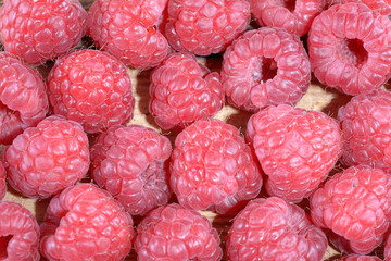 Ripe sweet raspberry close up