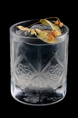 Tincture of white wine on lime on a dark background