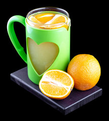 Hot tea with oranges and lemon on a black background