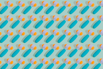 A large number of repeating objects in a solid color background