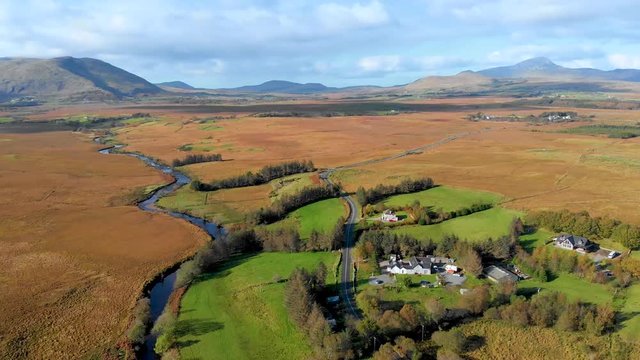 River and road in desert fields of Connemara National Park