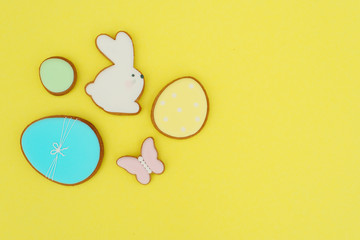 Easter card with gingerbread cookies. Egg shaped cookies and easter bunny.