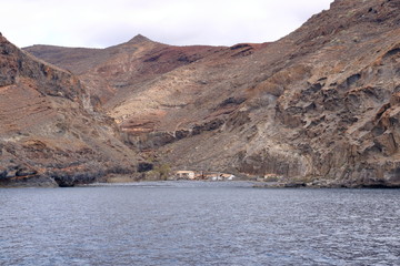 Spain La Gomera island playa la cantera abandoned fish factory from the sea