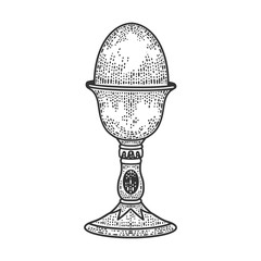 egg on eggcup stand sketch engraving vector illustration. T-shirt apparel print design. Scratch board imitation. Black and white hand drawn image.