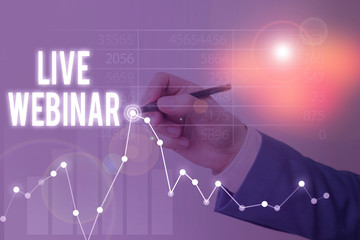 Conceptual hand writing showing Live Webinar. Concept meaning seminar that is transmitted over the...