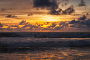 Magical dramatic sunset on a tropical beach.
