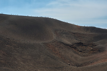 Trekking on the crest of the volcano on Mount Etna, Sicily, Italy