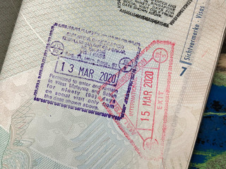 Einreisestempel und Ausreisestempel für Malaysia in einem deutschen Reisepass
