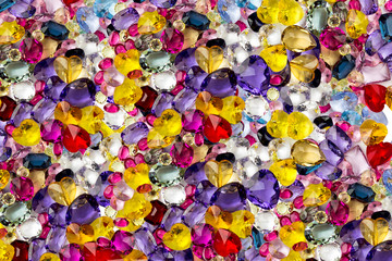 Fototapeta na wymiar Many multicolored gems background