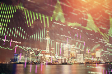 Financial graph on night city scape with tall buildings background multi exposure. Analysis concept.