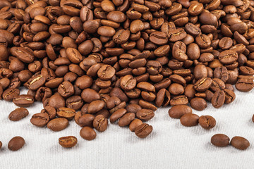 Roasted coffee beans on canvas