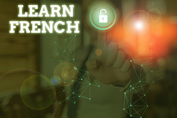 Conceptual hand writing showing Learn French. Concept meaning get knowledge or skill in speaking...