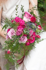 wedding purple boho bouquet in bride's hands