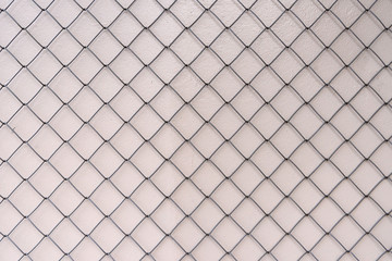 Mesh netting on a light background
