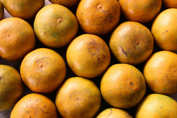 Group of sweet green Thai orange, fresh fruit use for background