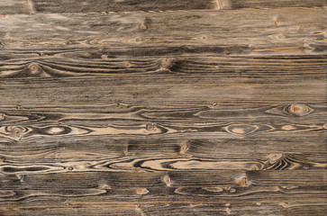 Old wooden background from boards with beautiful walnut color