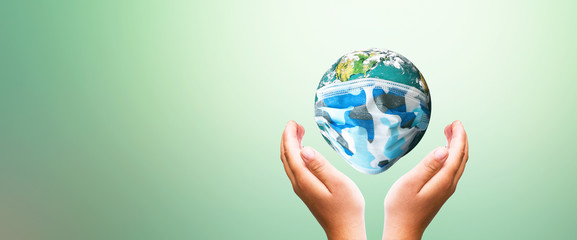 Corona virus COVID-19 concept: earth put mask to fight against Corona virus