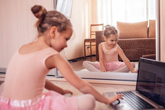 Young Ballerina Practicing Classic Choreography During Online Class In Ballet School, Self-isolation