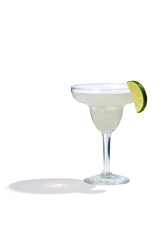Daiquiri cocktail is contained in a margarita glass with a lime slice on the rim. The showy illustrative picture is made on the white background.