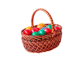 Easter eggs in wicker basket isolated on white. Selective focus.