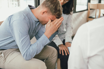 Fototapeta premium phychiatrist phychologist counselor therapist consulting giving relationship advice to couple. marrigae counseling