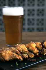 pepper salt chicken wings with Beer it's the best choice for summer days
