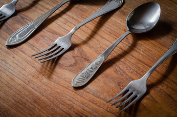 Set of old spoons and forks on the table. Vintage style
