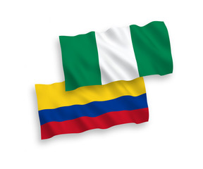 Flags of Colombia and Nigeria on a white background
