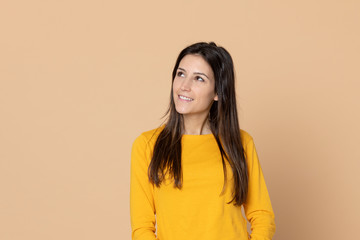 Fototapeta premium Attractive young girl wearing a yellow T-shirt