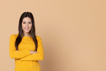 Attractive young girl wearing a yellow T-shirt