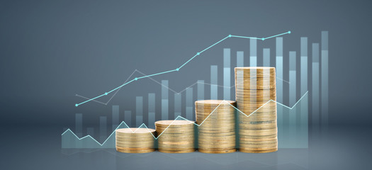 Graph stock market. Coins on stacks. investment and saving concept