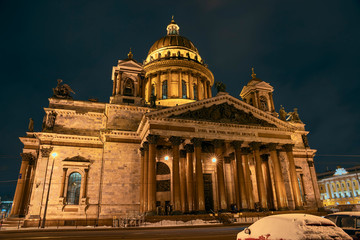 Fototapeta na wymiar view of the majestic facade of St. Isaac's Cathedral against the dark night sky