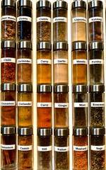 Labelled glass spice jars.