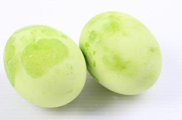 preserved duck eggs on white background