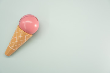 Cute wooden icecreme toy with copy space. Theme for sweet and children dessert.