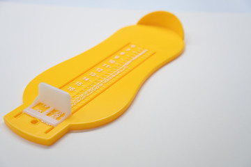 Foot Measurement on white background. Concept for shoe size and foot fitting .