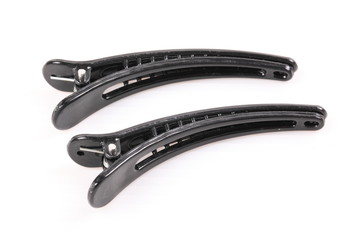 Obraz premium A pair of hair clips isolated on the white background