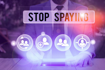 Handwriting text writing Stop Spaying. Conceptual photo quit in secretly obtain information on an...