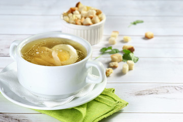 chicken broth with egg and crackers