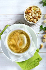 chicken broth with egg and crackers