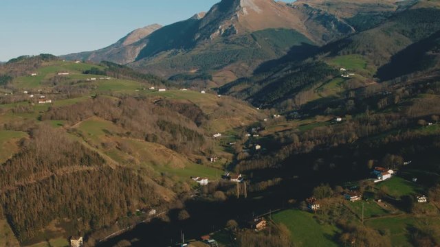 4K Aerial Basque Country industrial town in rural landscape
