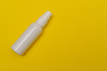 white container for cosmetic spray